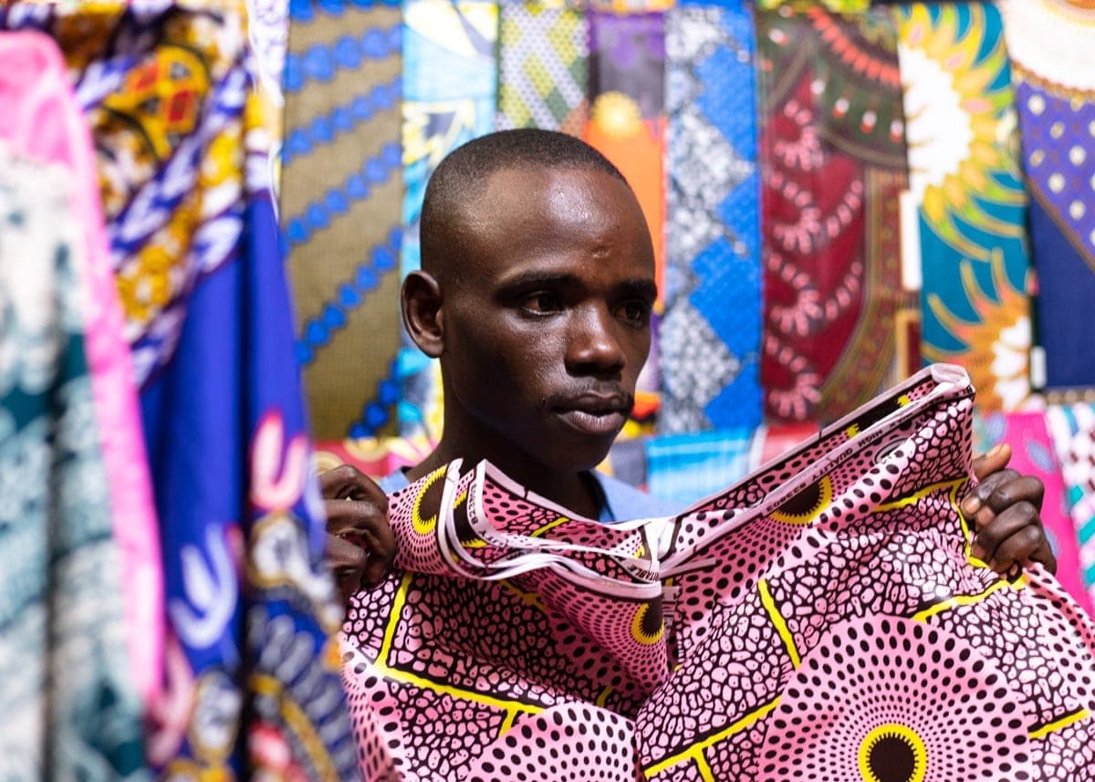 Fabric seller at Kimironko market